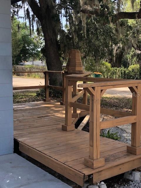 1401 East Alfred Street, Unit 9 Tavares, FL 32778 - Photo 11 of 18 a view of outdoor space and deck