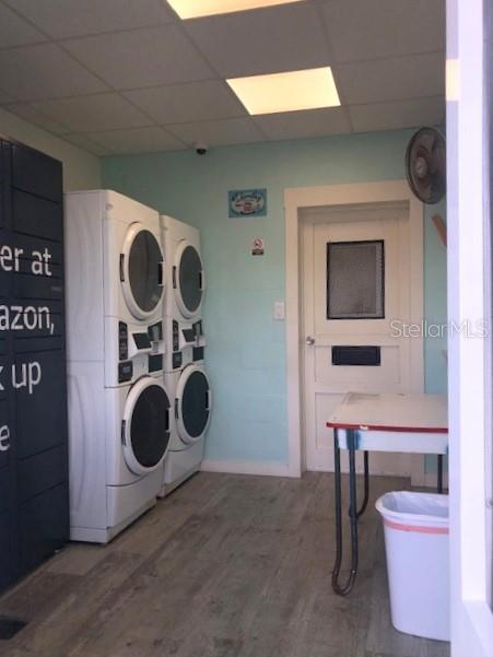 1401 East Alfred Street, Unit 9 Tavares, FL 32778 - Photo 15 of 18 a view of a storage and utility room with washer and dryer