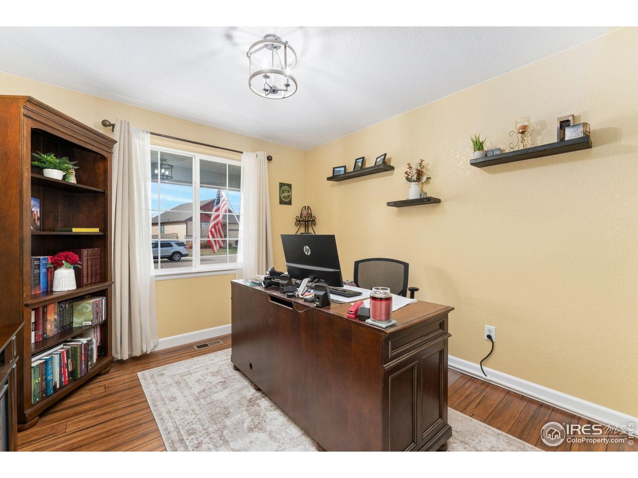 11420 Coal Ridge Street Firestone, CO 80504 - Photo 15 of 31 a view of a workspace with furniture