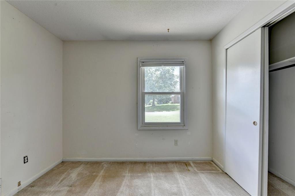 1577 Harbour Oaks Road Tucker, GA 30084 - Photo 42 of 58 an empty room with a window