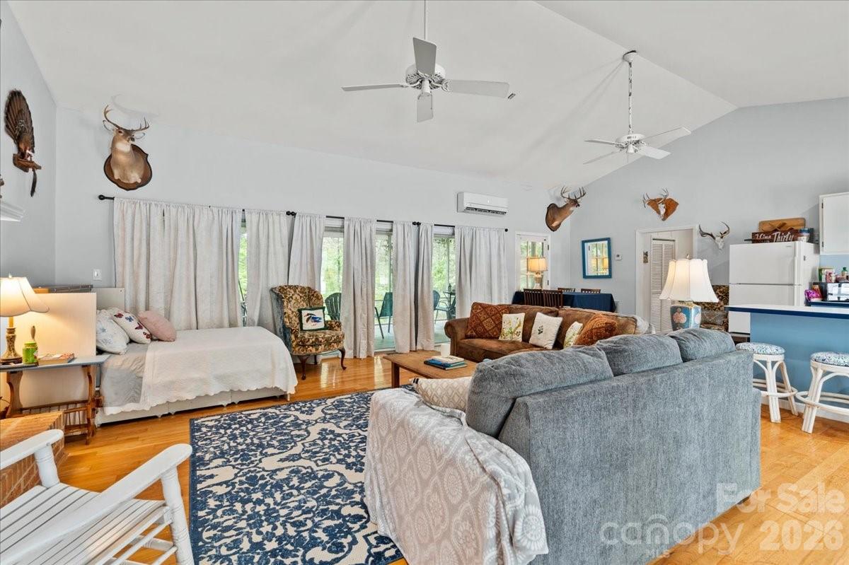 209 Fairway Road Cheraw, SC 29520 - Photo 35 of 48 a living room with furniture ceiling fan and a rug