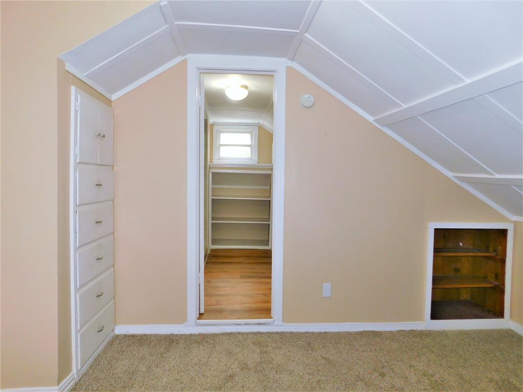 216 Maple Street, Unit 2 Denton, TX 76201 - Photo 12 of 16 wooden floor and window in a room