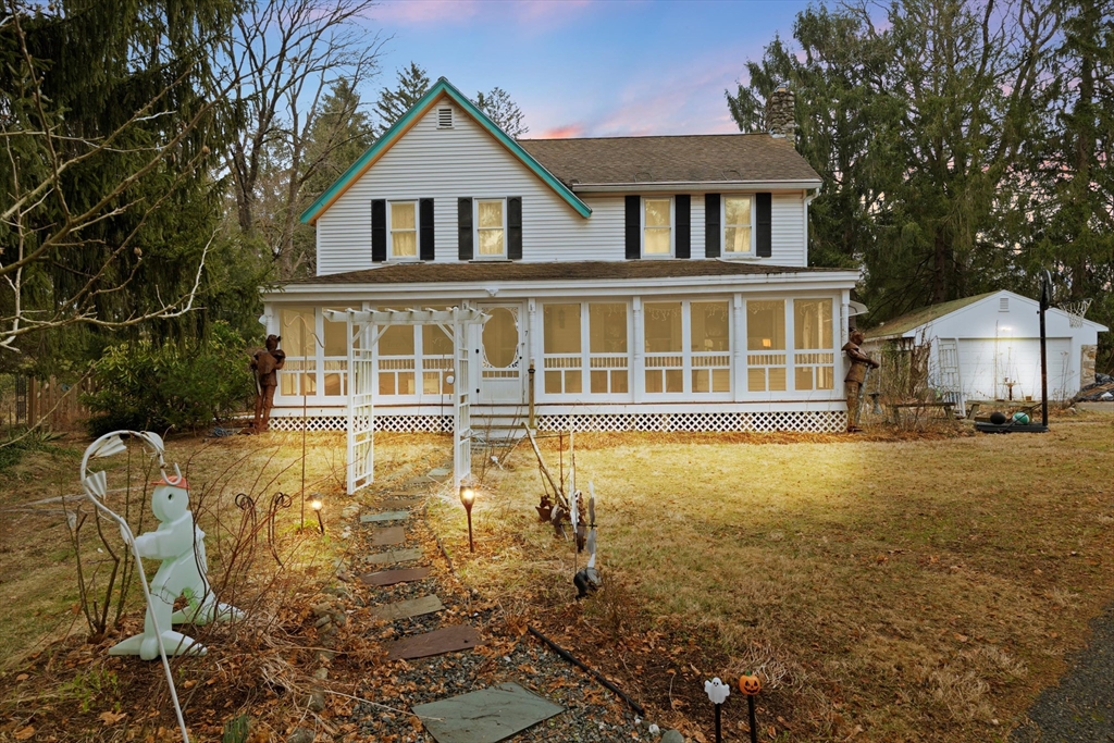 7 Shufelt Road South Walpole, MA 02071 - Photo 1 of 22 front view of a house with a yard