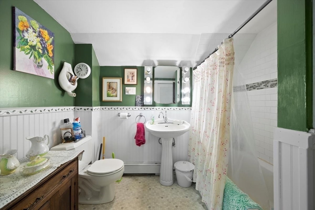 7 Shufelt Road South Walpole, MA 02071 - Photo 13 of 22 a bathroom with a sink toilet and mirror