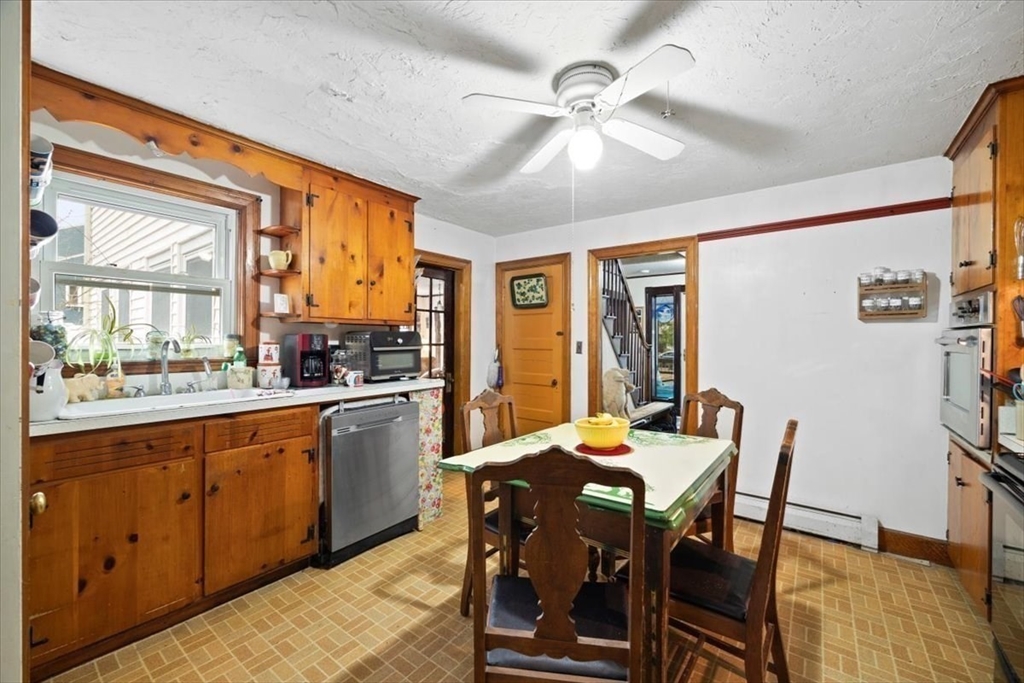 7 Shufelt Road South Walpole, MA 02071 - Photo 8 of 22 a view of a dining room with furniture window and wooden floor