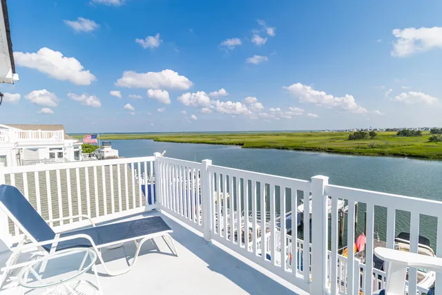 a view of a chairs and table on the terrace