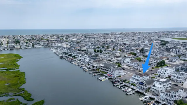 an aerial view of a house with a garden
