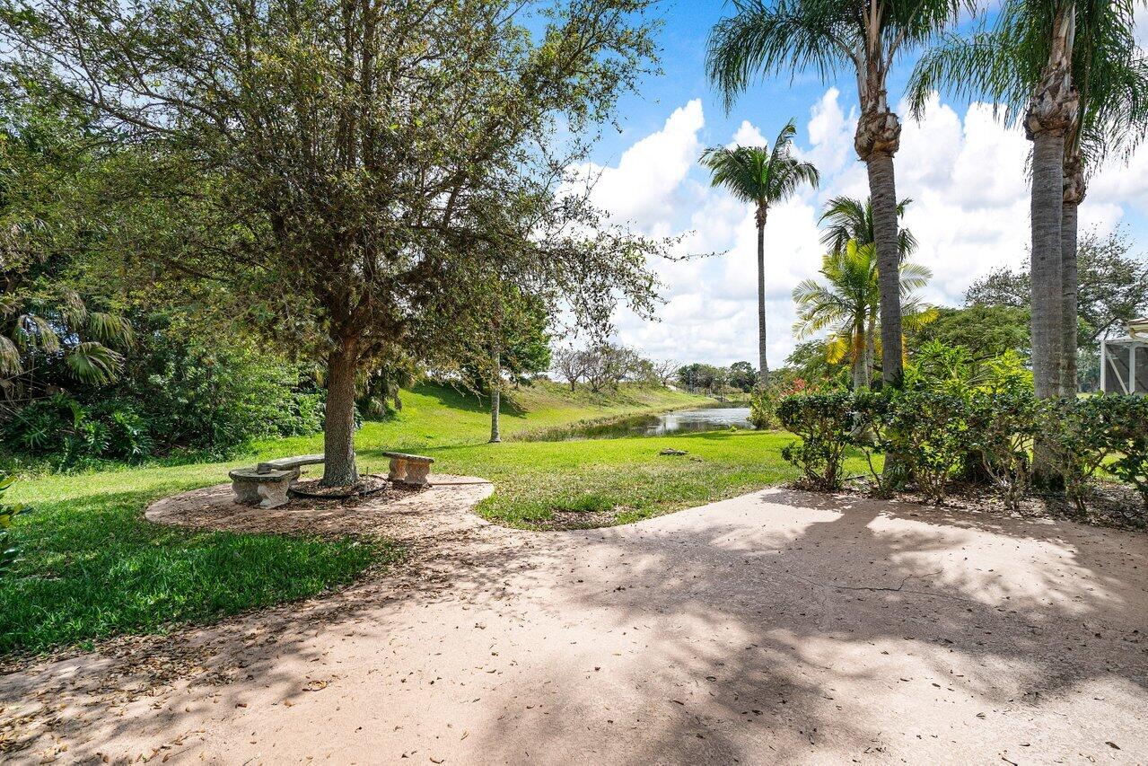 521 Southwest Lake Manatee Way Port St. Lucie, FL 34986 - Photo 29 of 33 a view of a park