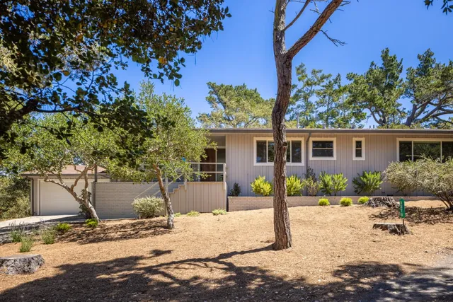 a view of a backyard of a house