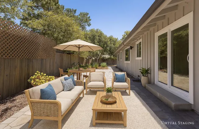 a view of a backyard with pathway