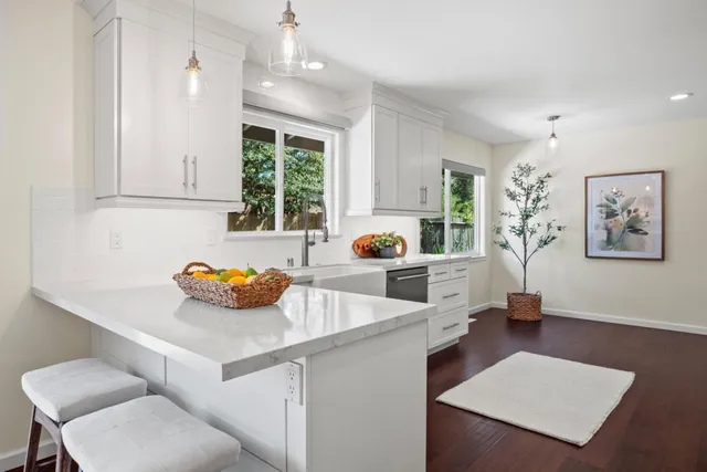 a living room with furniture and window