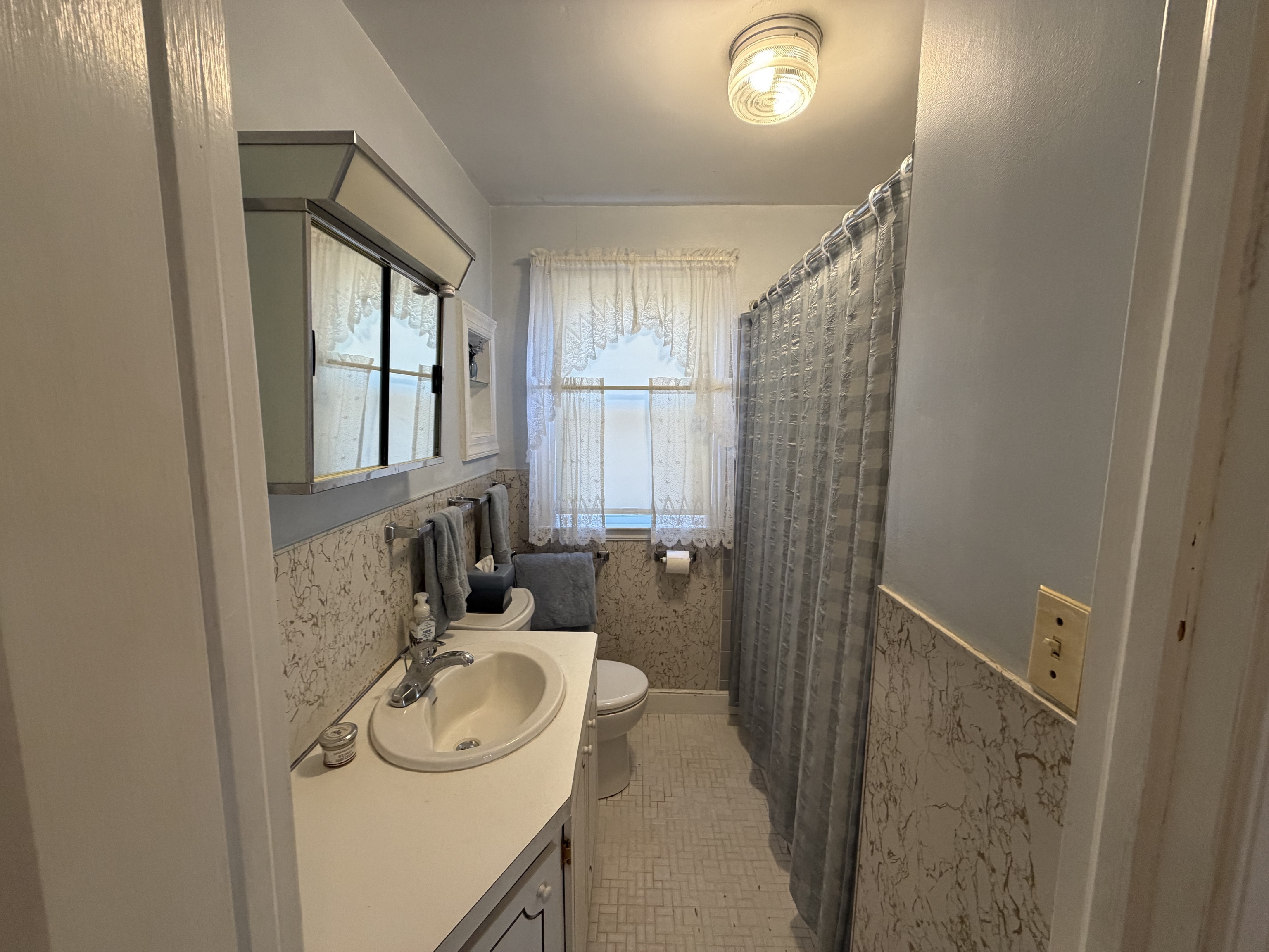 65 Clark Hill Road Prospect, CT 06712 - Photo 17 of 30 a bathroom with a sink a toilet and shower