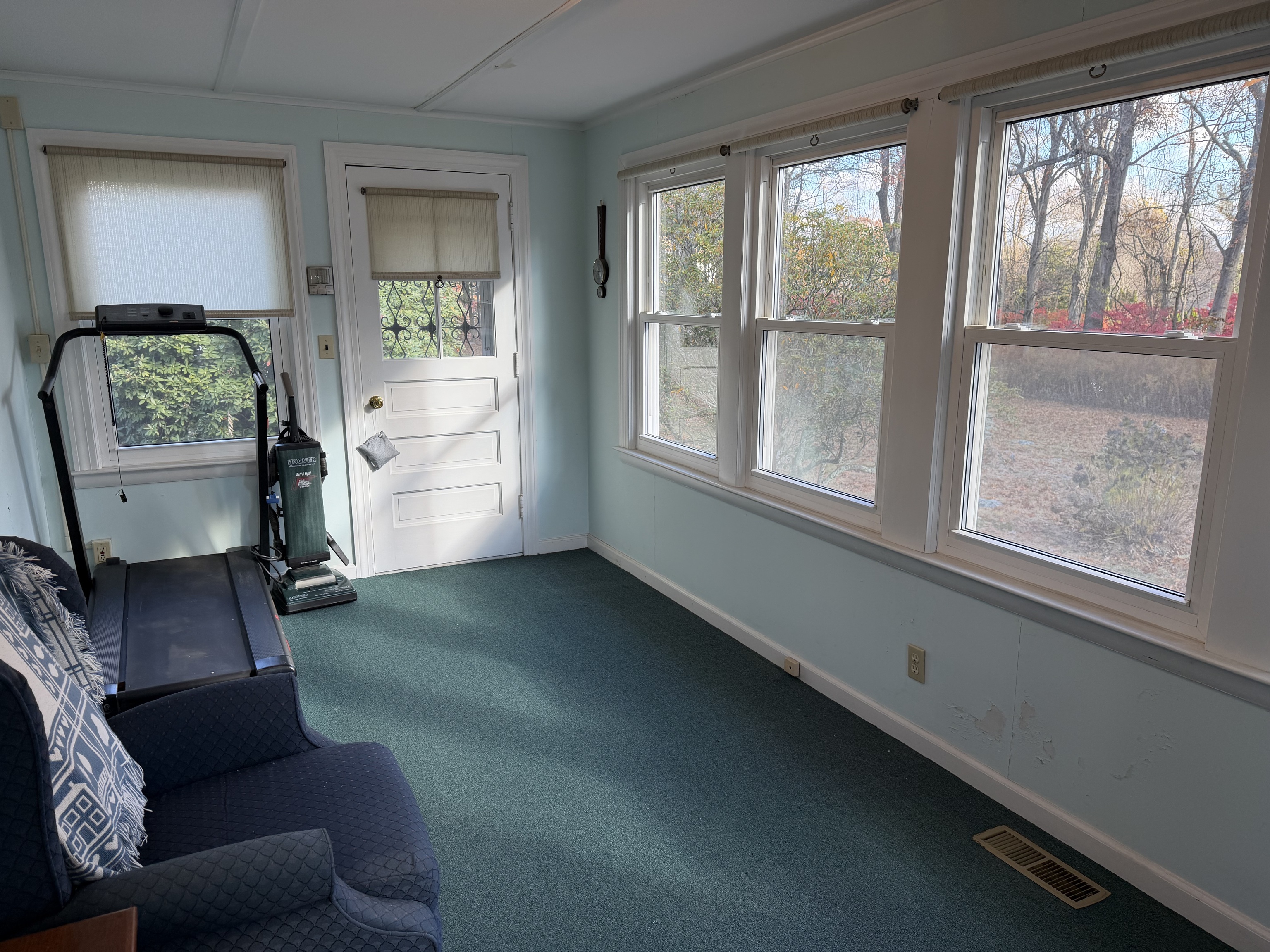 65 Clark Hill Road Prospect, CT 06712 - Photo 19 of 30 a living room with furniture and a window