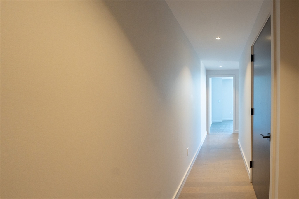 55 Lagrange Street, Unit 1708 Boston, MA 02111 - Photo 12 of 18 a view of a hallway