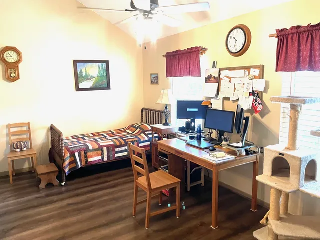 a view of a workspace with furniture