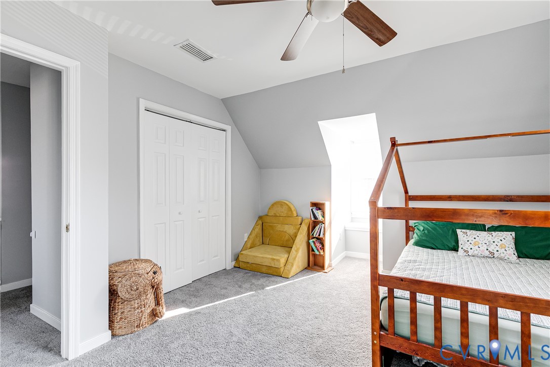 14710 Mill Spring Drive Midlothian, VA 23112 - Photo 21 of 24 a bedroom with a bed and a painting on the wall
