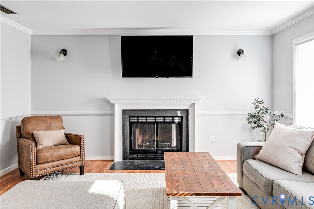 14710 Mill Spring Drive Midlothian, VA 23112 - Photo 4 of 24 a living room with furniture and a fireplace