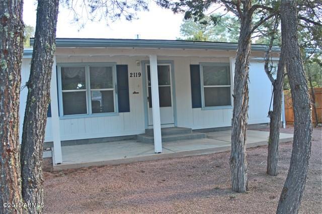 2119 Blue Jay Road Overgaard, AZ 85933 - Photo 16 of 28 a view of entrance gate of a house