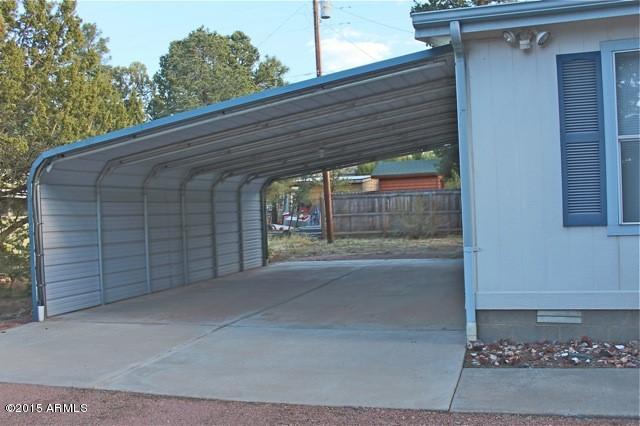 2119 Blue Jay Road Overgaard, AZ 85933 - Photo 27 of 28 a backyard of a house