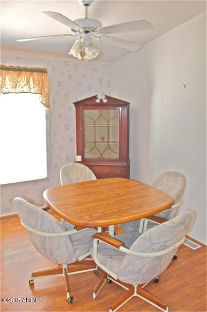 2119 Blue Jay Road Overgaard, AZ 85933 - Photo 8 of 28 a room with wooden floor