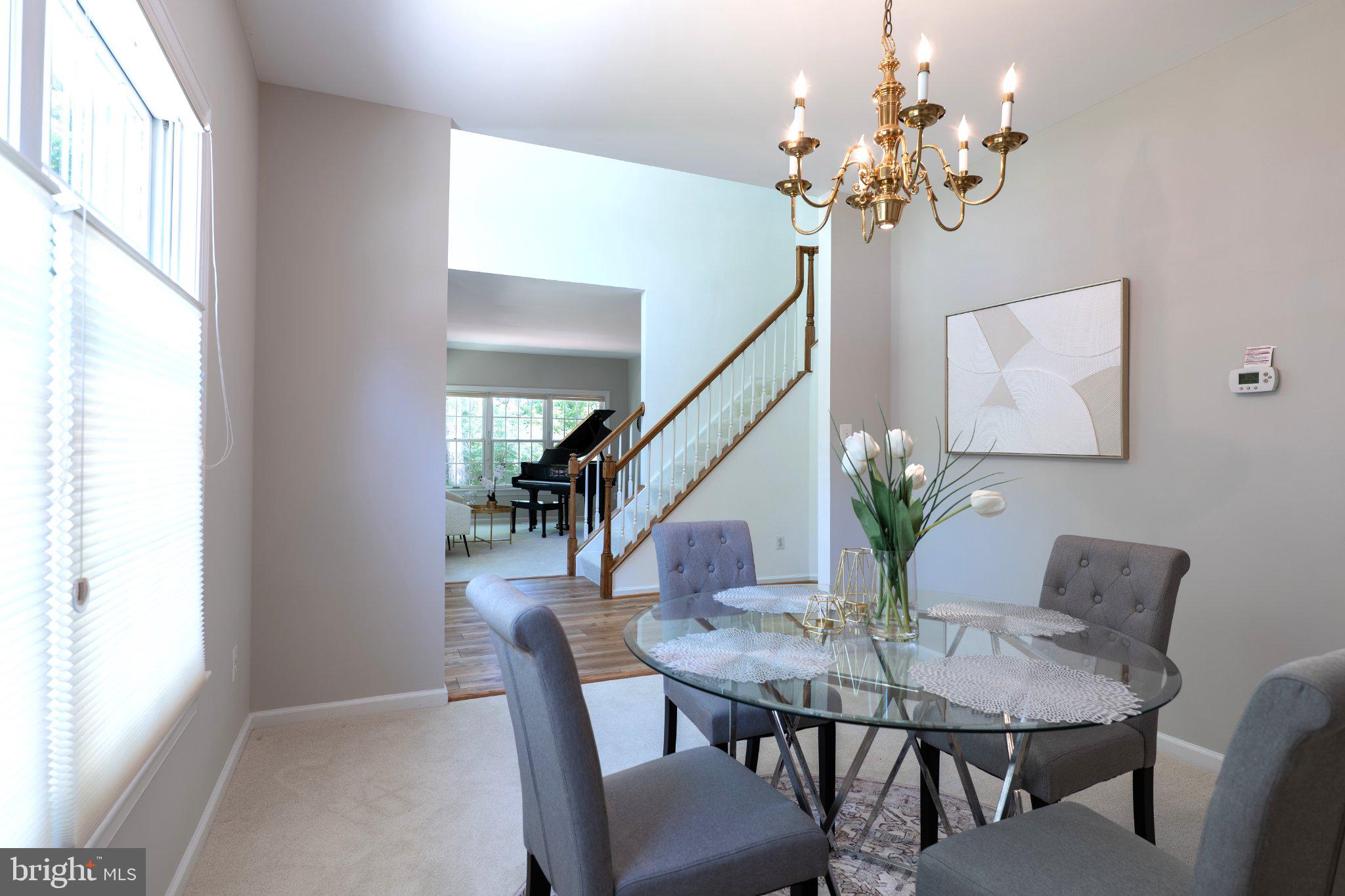 1211 Woodbrook Court Reston, VA 20194 - Photo 16 of 21 Elegant dining space with natural light.
