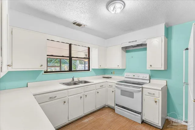 a view of an empty room with glass door