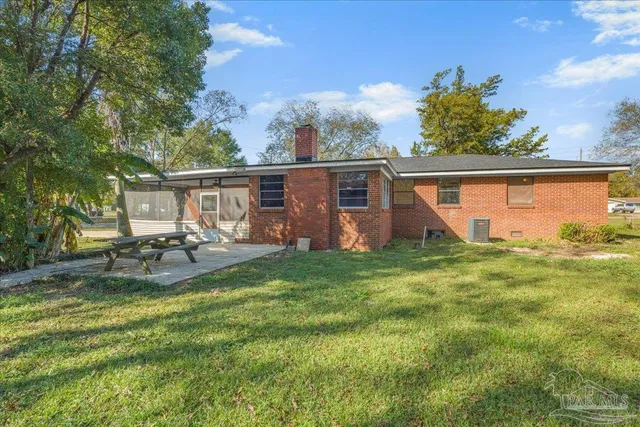 a view of backyard with green space