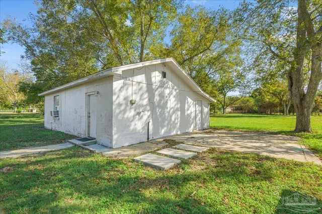 a view of an empty room and window