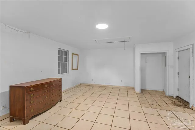 a bathroom with a shower and a sink