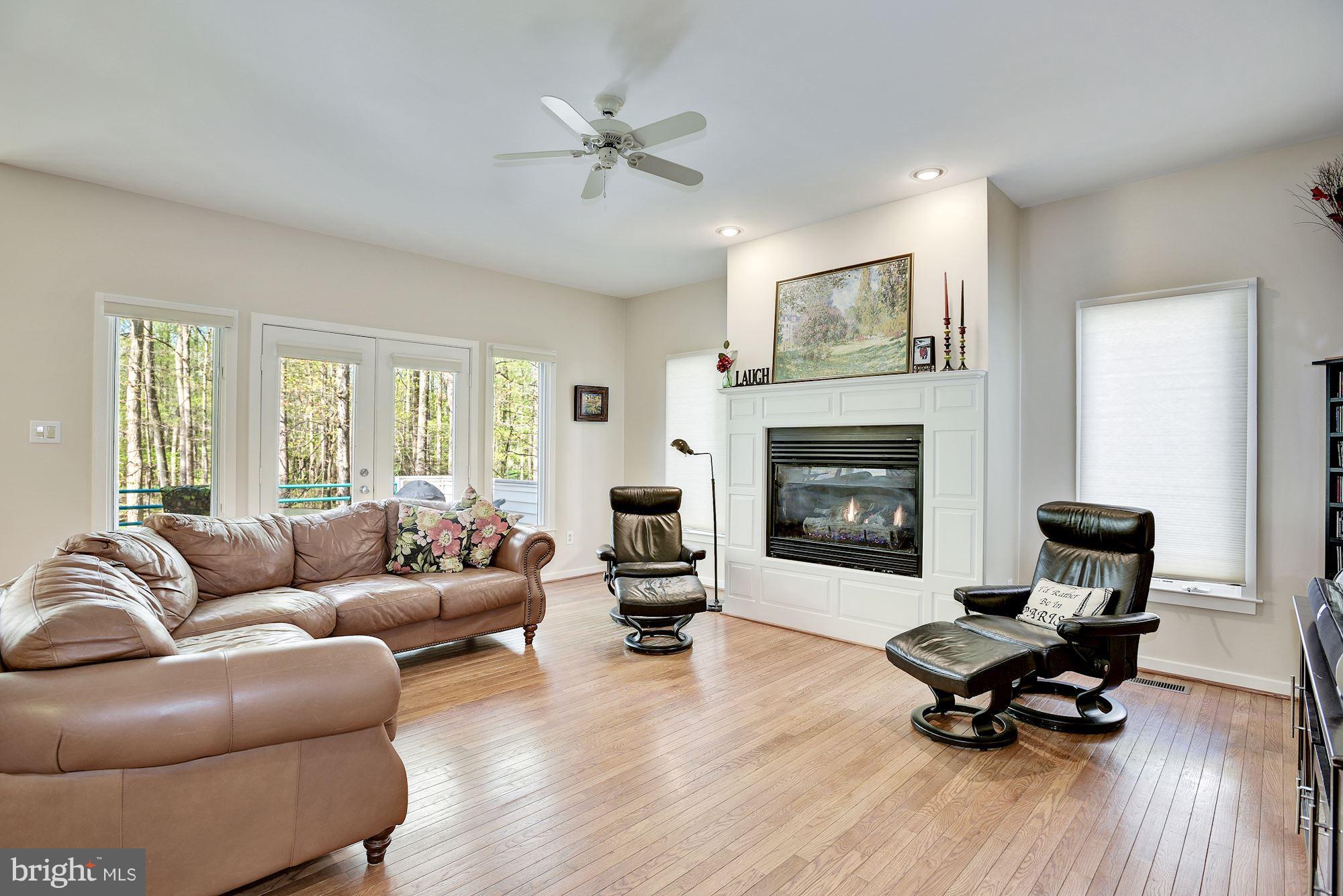 1106 Water Pointe Lane Reston, VA 20194 - Photo 5 of 30 Family Room with gas fireplace and ceiling fan