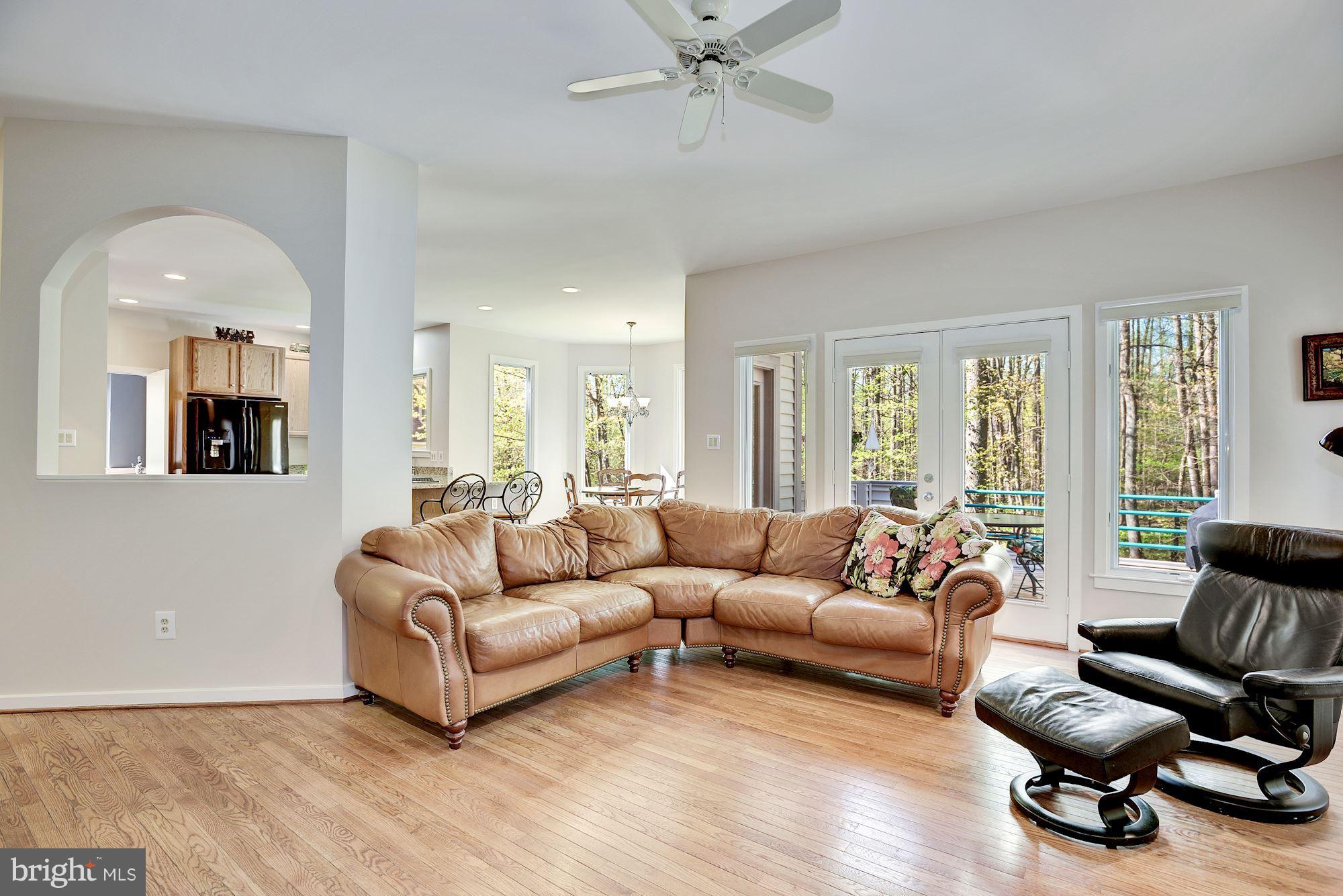 1106 Water Pointe Lane Reston, VA 20194 - Photo 7 of 30 Family Room opens to deck and flows to kitchen