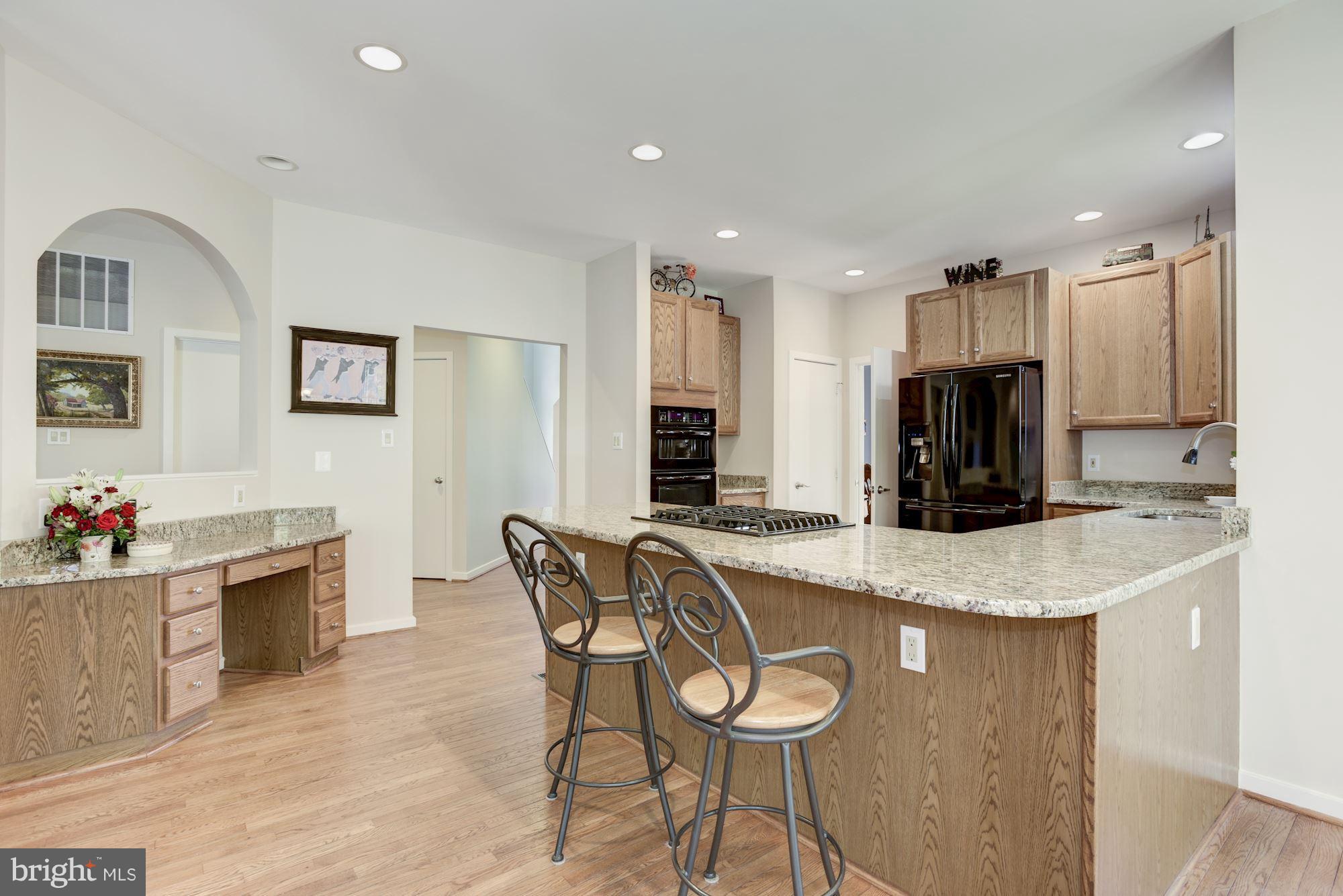 1106 Water Pointe Lane Reston, VA 20194 - Photo 10 of 30 New granite, cooktop, dishwasher in Kitchen