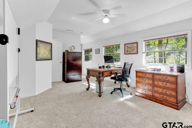 a workspace with furniture hardwood and a window
