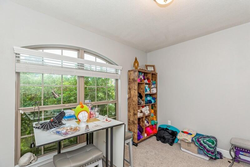 4640 Hermosa Road Crestview, FL 32539 - Photo 24 of 37 a living room with a large window and furniture