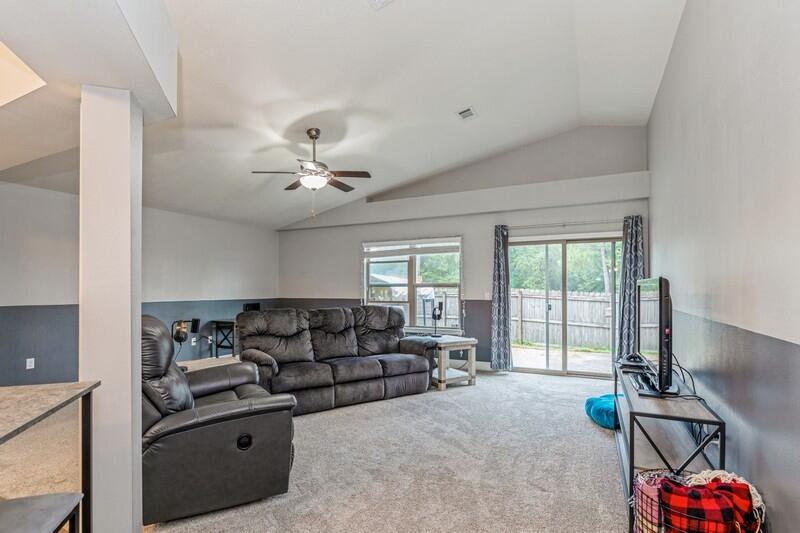 4640 Hermosa Road Crestview, FL 32539 - Photo 8 of 37 a living room with furniture and a flat screen tv