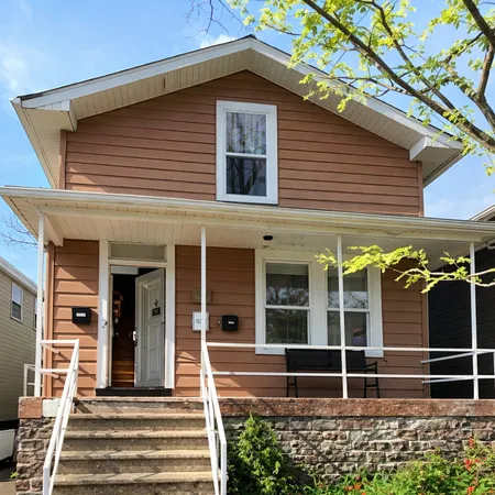 a front view of a house with a window