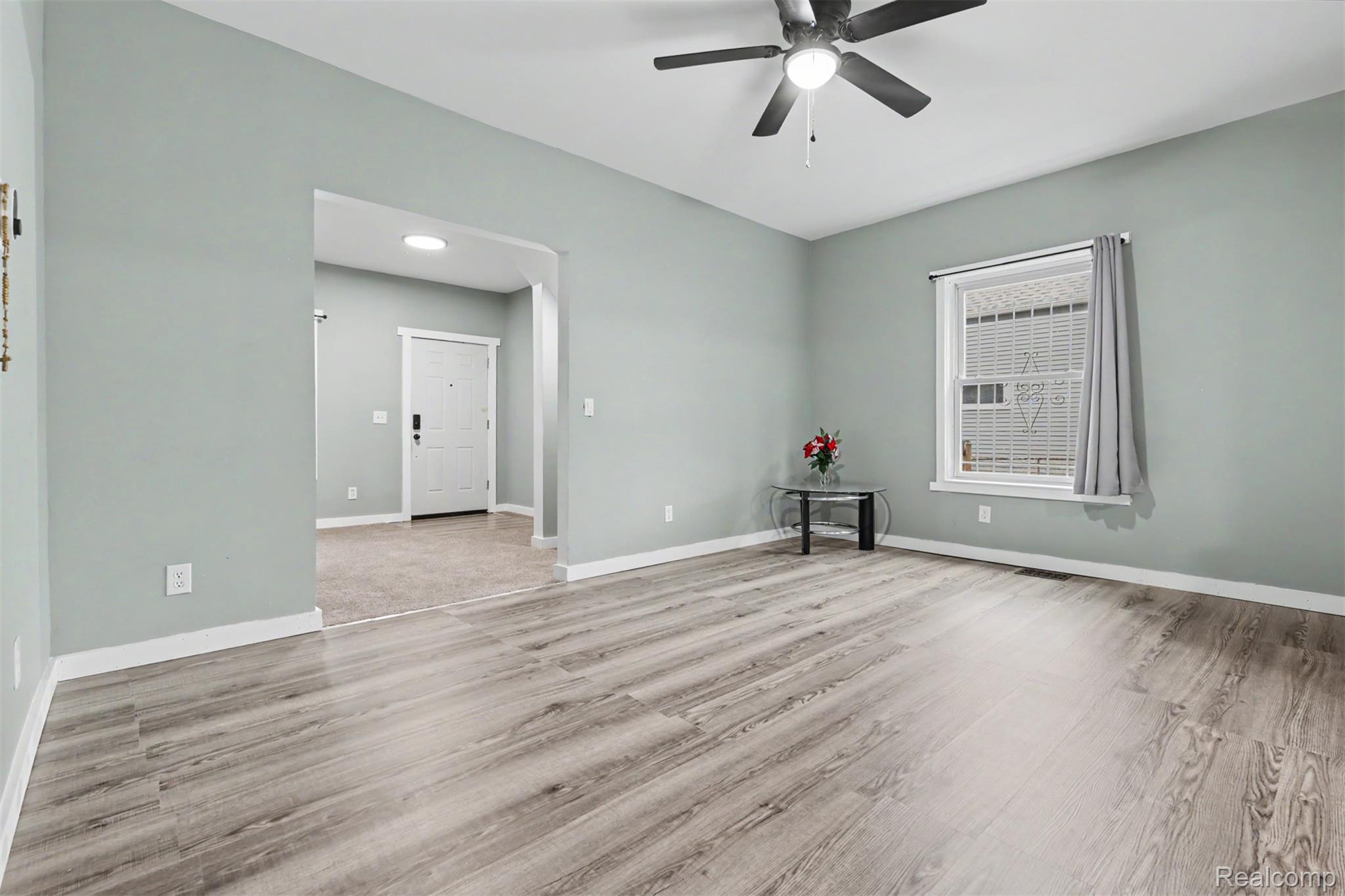 8397 Lane Street Detroit, MI 48209 - Photo 6 of 41 Light wood-finish flooring with white trim