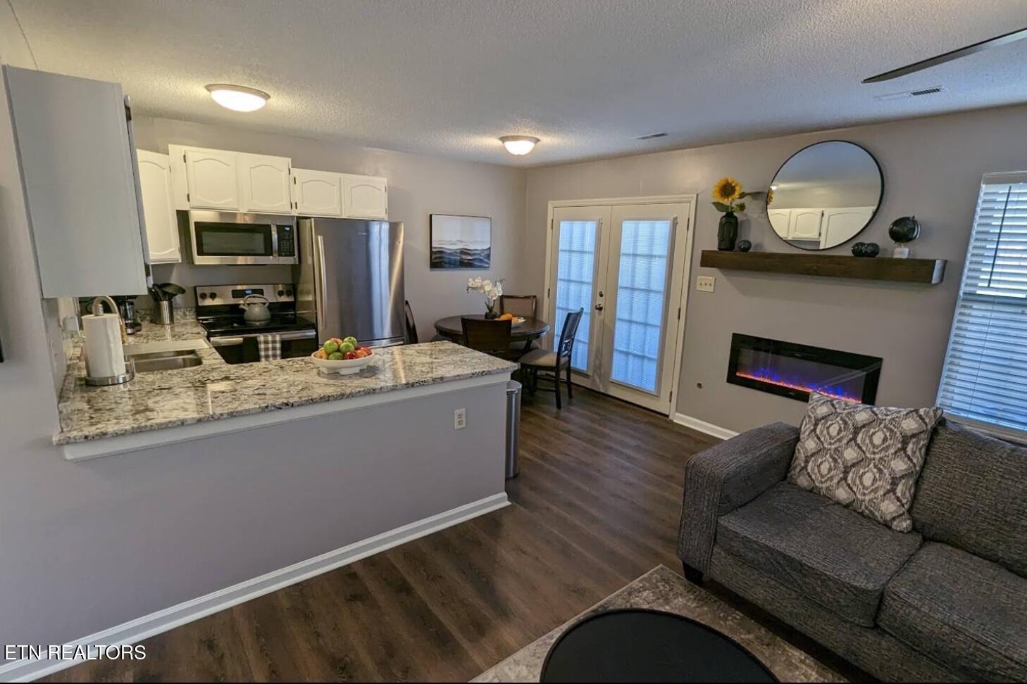 1303 Mountain Meadows Way Sevierville, TN 37862 - Photo 4 of 11 83F061BF-ADEE-4BF5-BBC8-CB552AEB2768