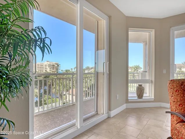 a kitchen with stainless steel appliances granite countertop a sink and a microwave