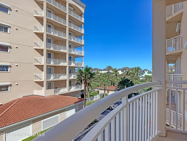 a bedroom with a bed and chair