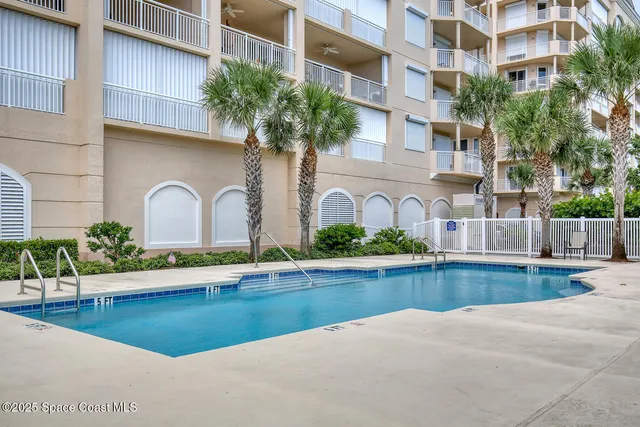 a view of a patio with a backyard