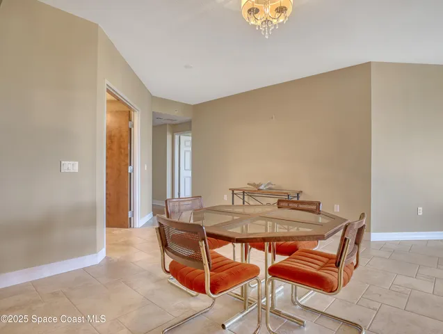 a view of a porch with a floor to ceiling window
