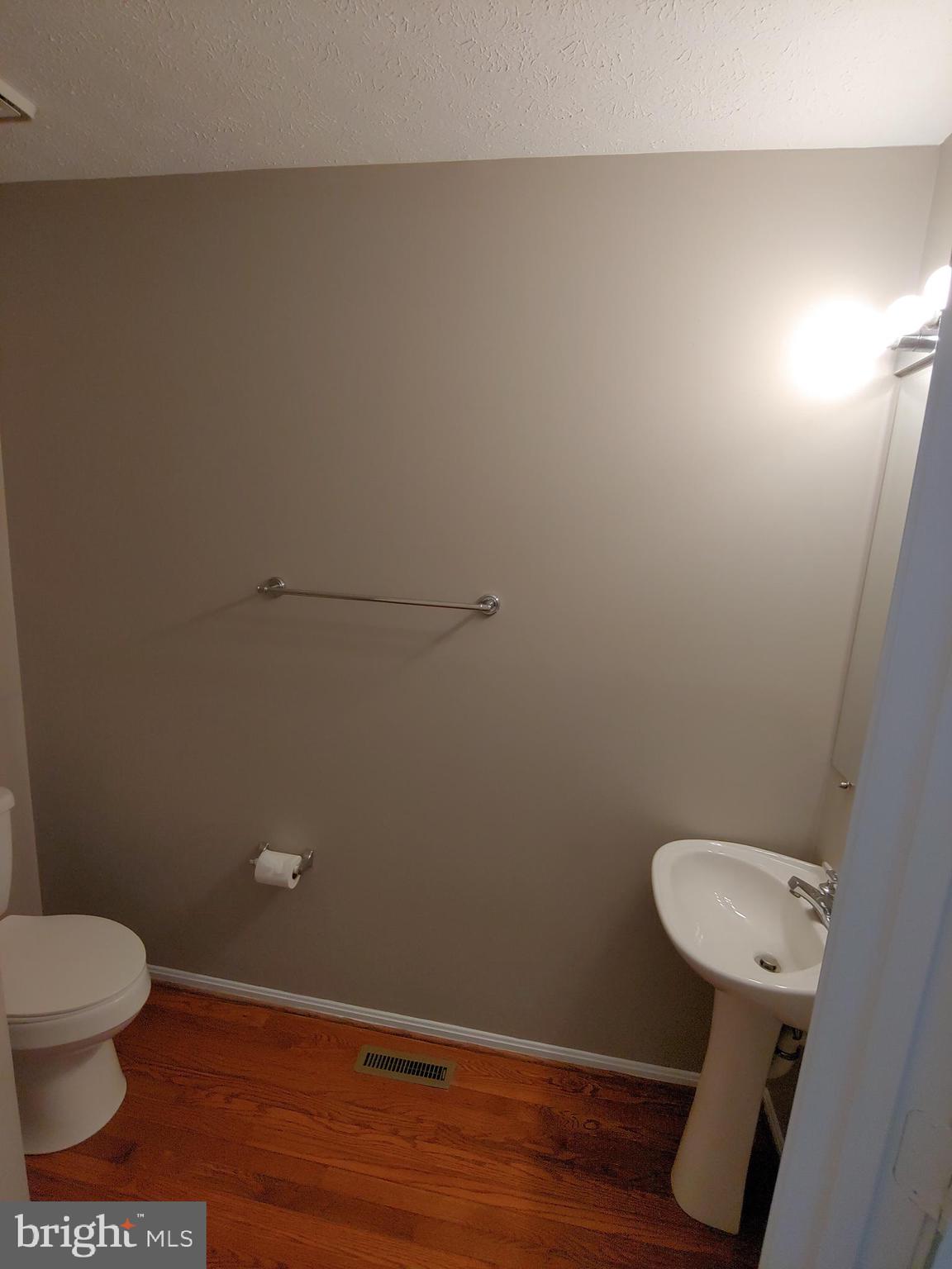 6010 Grenfell Loop Bowie, MD 20720 - Photo 15 of 32 a bathroom with a toilet