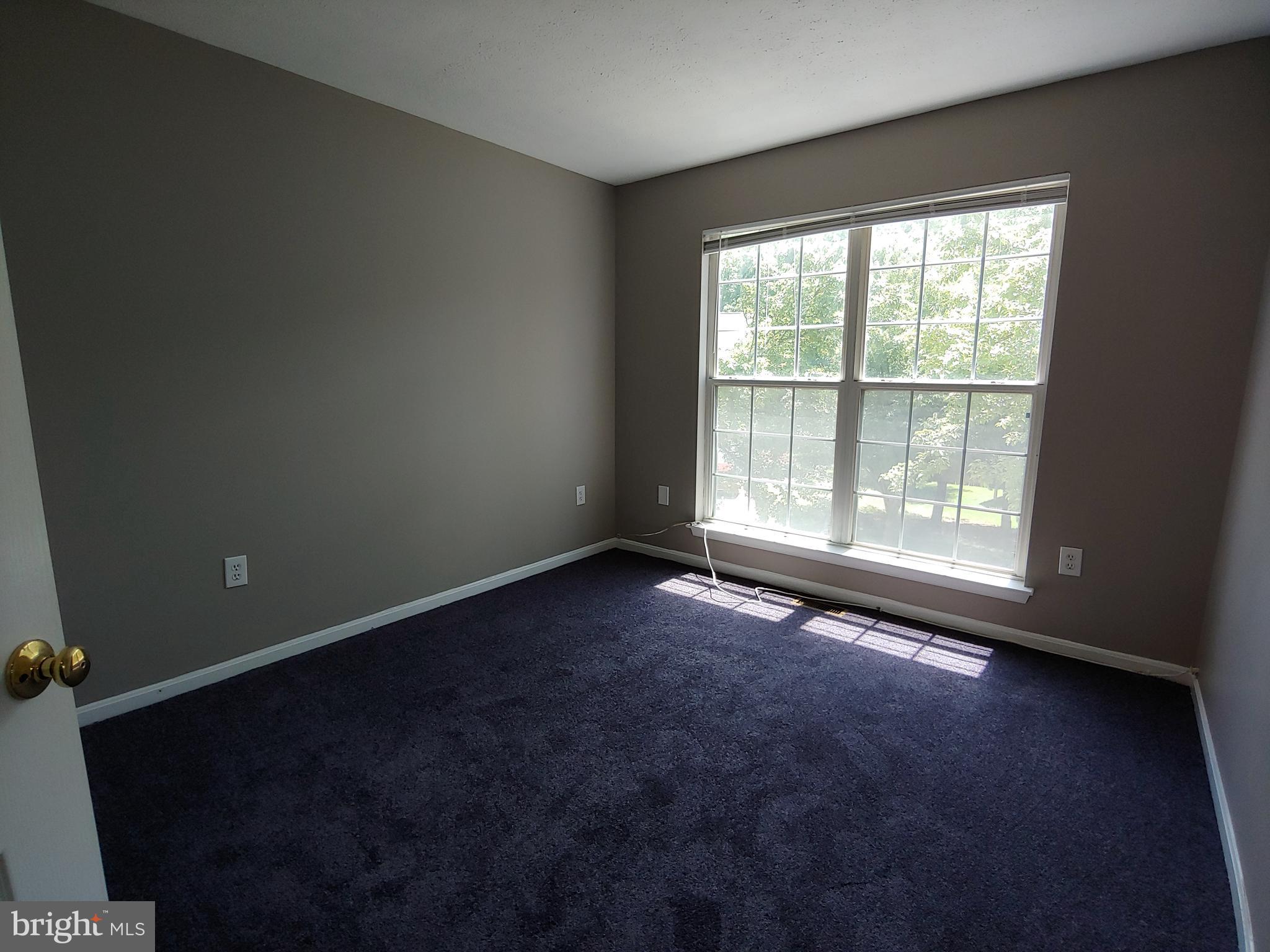 6010 Grenfell Loop Bowie, MD 20720 - Photo 17 of 32 a view of an empty room with a window