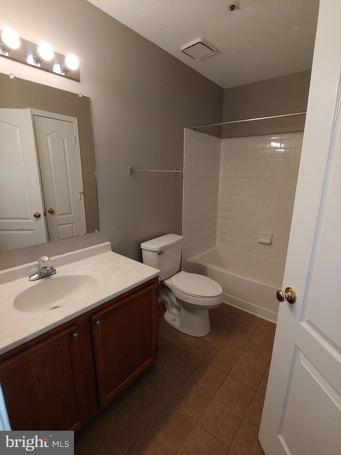 6010 Grenfell Loop Bowie, MD 20720 - Photo 21 of 32 a bathroom with a sink a toilet and shower