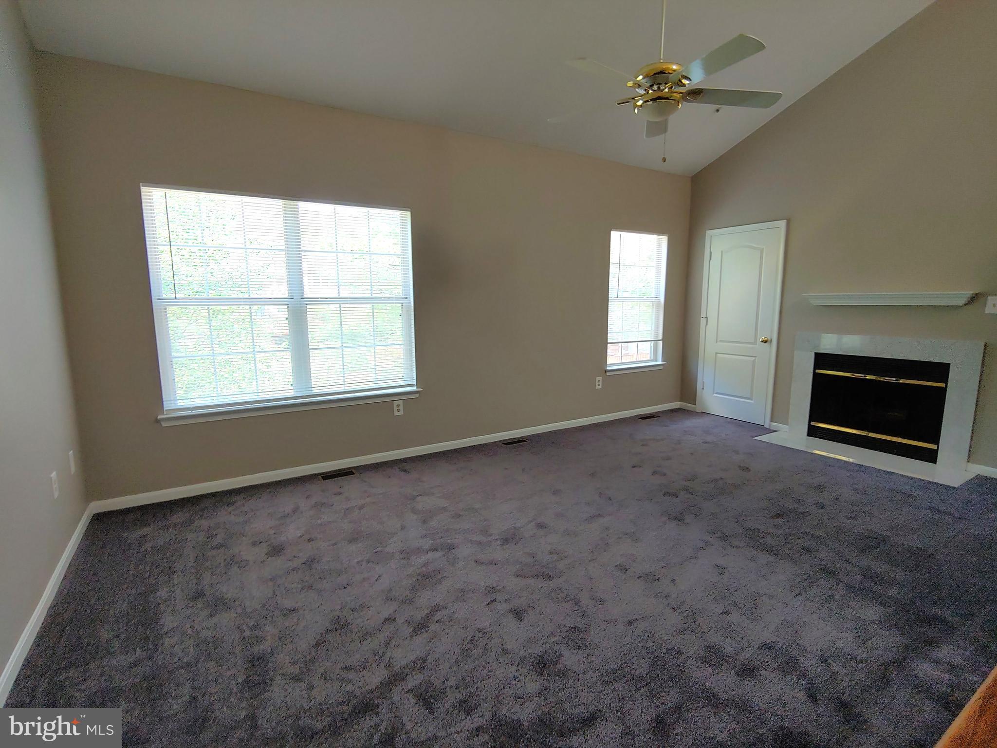 6010 Grenfell Loop Bowie, MD 20720 - Photo 22 of 32 a view of empty room with a fireplace