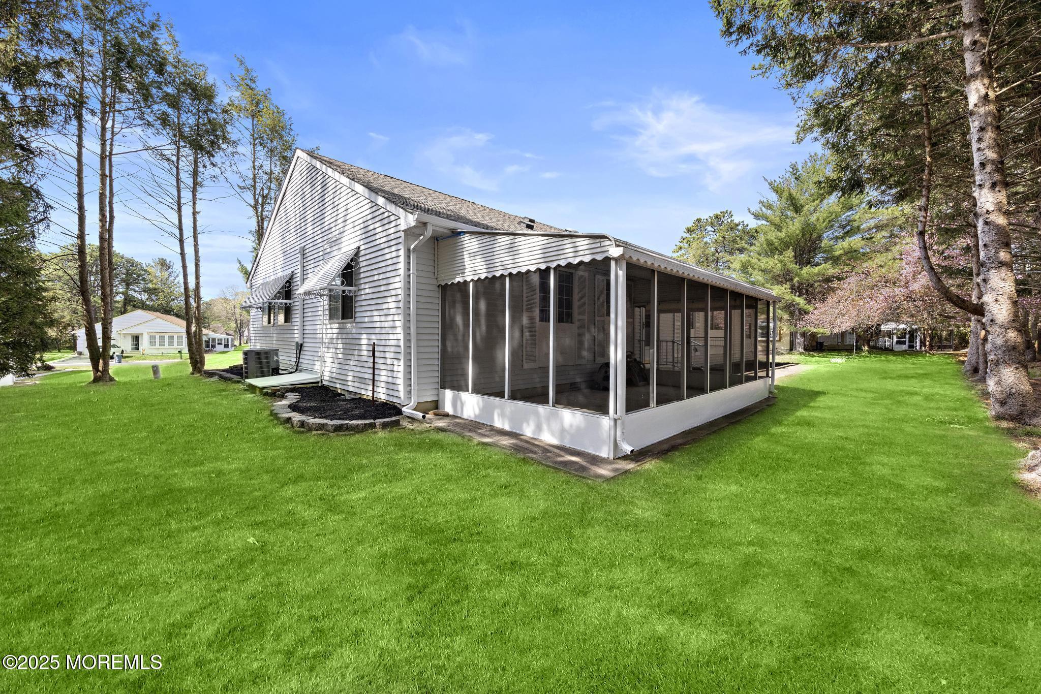 99 Sunset Road, Unit 60 Whiting, NJ 08759 - Photo 23 of 29 Enclosed Patio