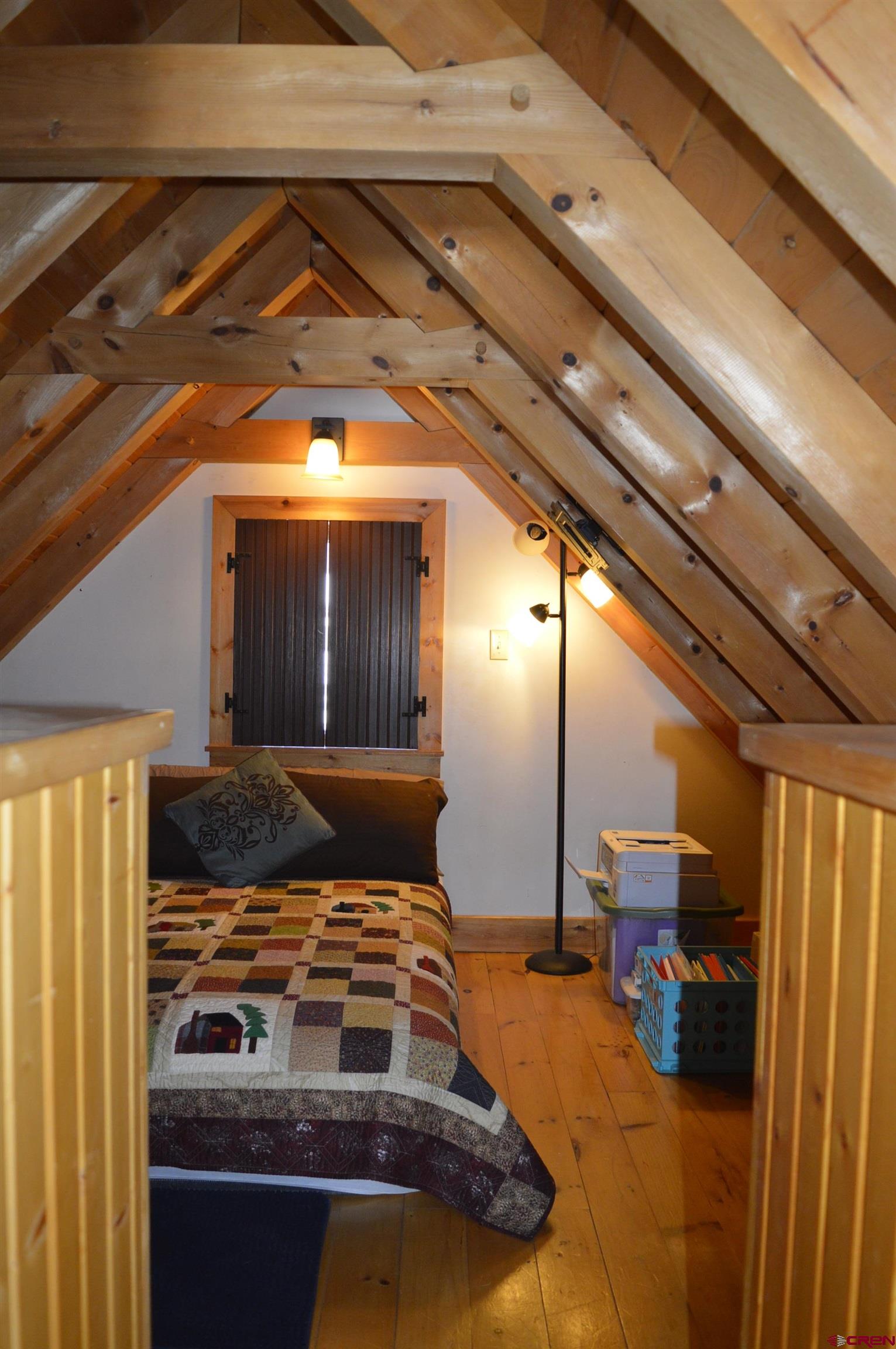 1505 Cement Street Silverton, CO 81433 - Photo 13 of 21 a bedroom with a bed and a window