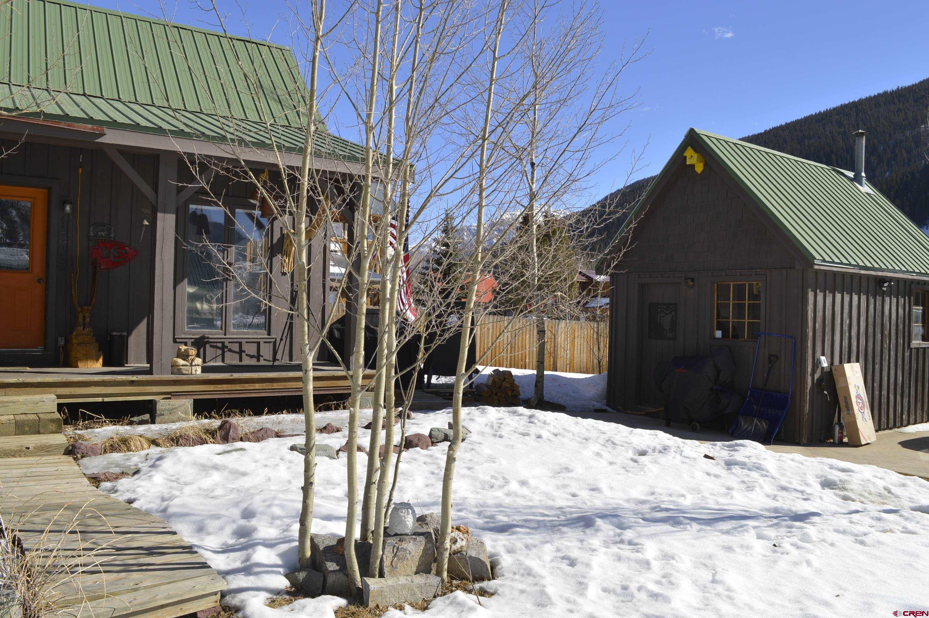 1505 Cement Street Silverton, CO 81433 - Photo 3 of 21 a view of a house with snow on the road