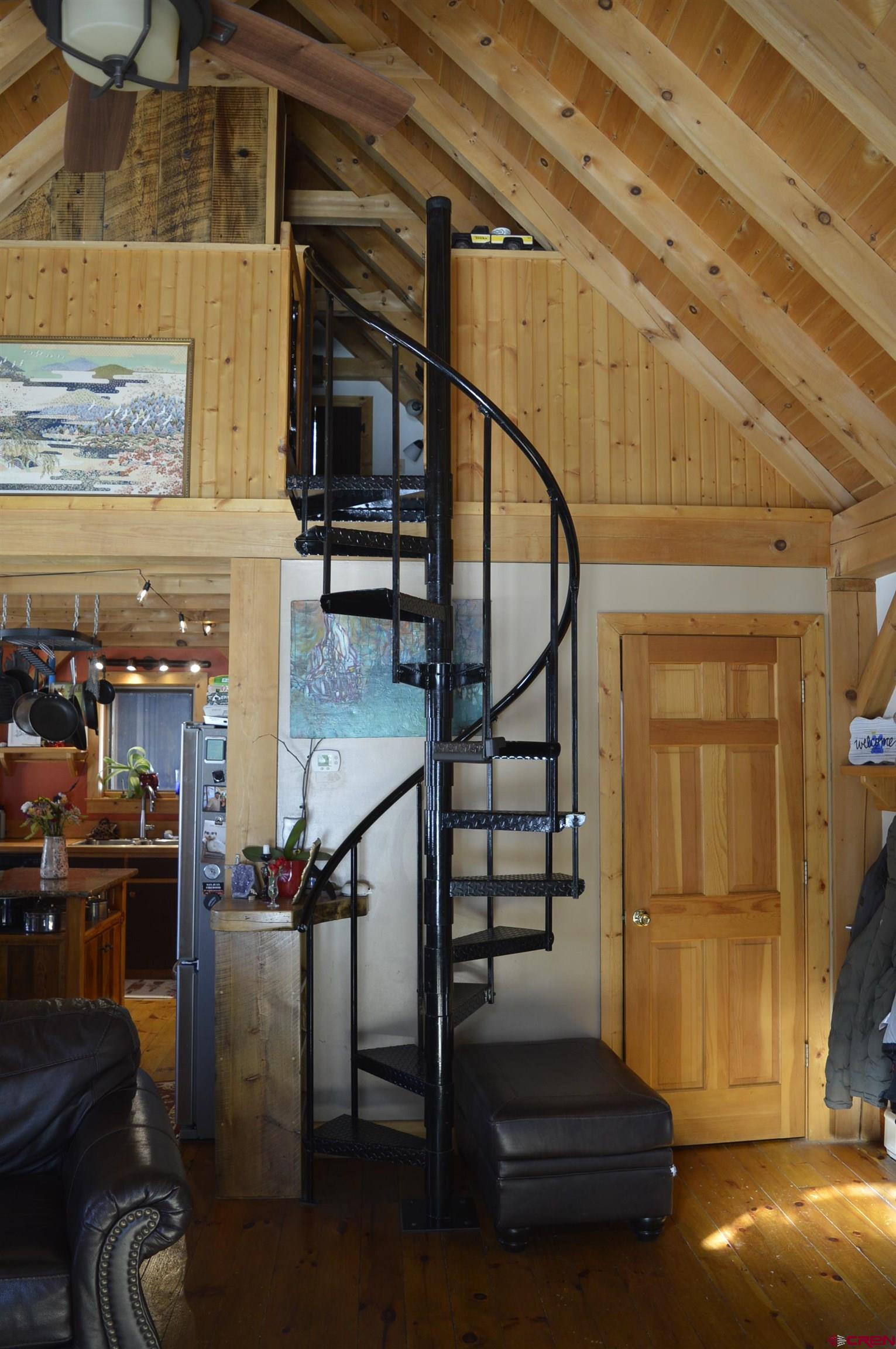 1505 Cement Street Silverton, CO 81433 - Photo 5 of 21 a view of entryway livingroom and hall with wooden floor